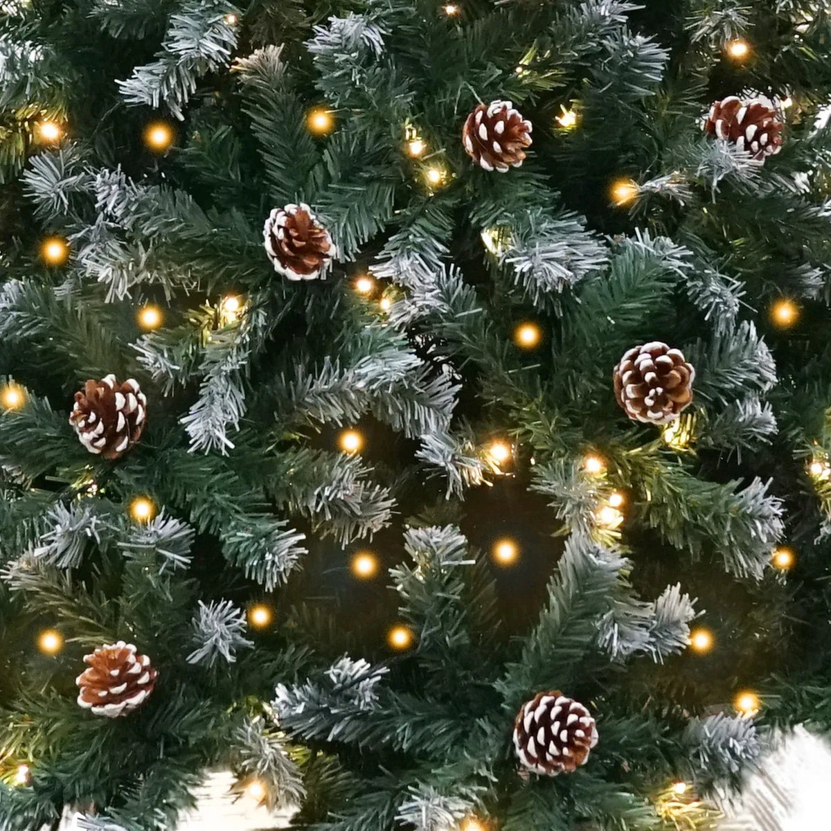 Christabelle 2.4m Pre-Lit LED Artificial Christmas Tree with Snow Tipped Needles Pine Cones Stand