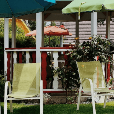 Outdoor chair under an umbrella