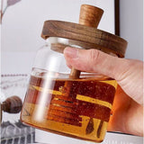 Honey jar glass rack dispenser set for home kitchen, with wooden stick and lid, transparent modern honey syrup glass container, used for storing gifts,