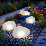 2pcs solar simulated pebble garden lights, frosted texture blends naturally, smart light control auto on/off, waterproof and weather-resistant, stable placement, ideal for garden, lawn, pathway, and landscape lighting.*Warm light