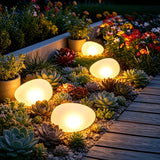 2pcs solar simulated pebble garden lights, frosted texture blends naturally, smart light control auto on/off, waterproof and weather-resistant, stable placement, ideal for garden, lawn, pathway, and landscape lighting.*Warm light