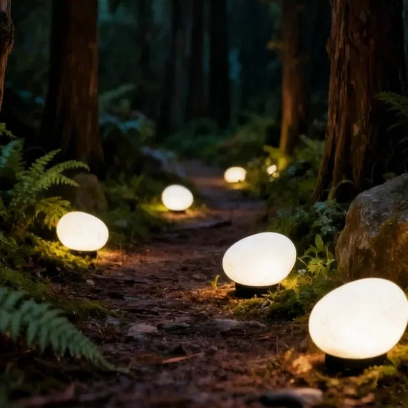 2pcs solar simulated pebble garden lights, frosted texture blends naturally, smart light control auto on/off, waterproof and weather-resistant, stable placement, ideal for garden, lawn, pathway, and landscape lighting.*Warm light