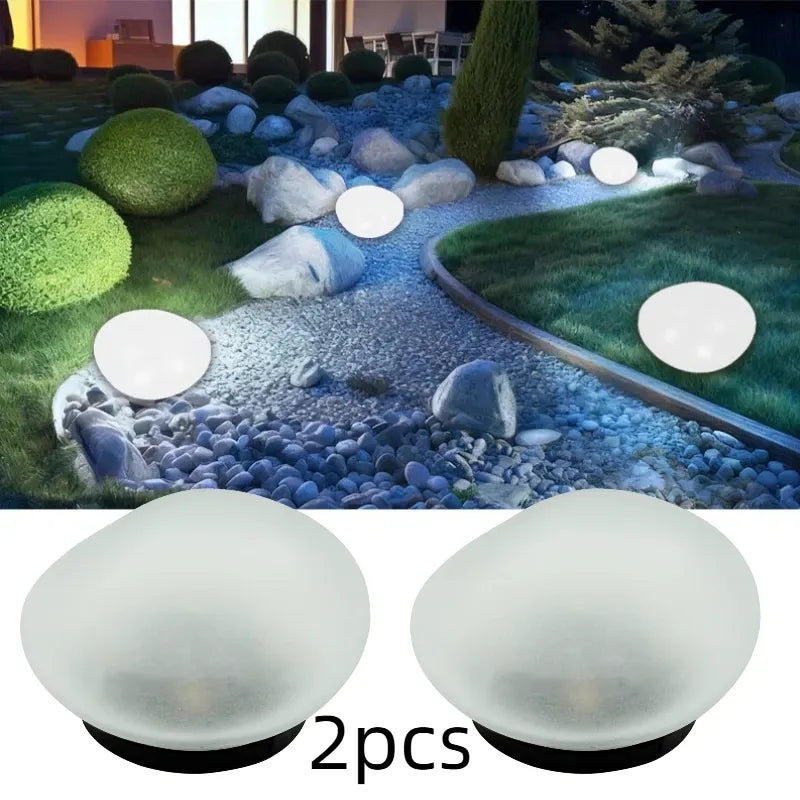2pcs solar simulated pebble garden lights, frosted texture blends naturally, smart light control auto on/off, waterproof and weather-resistant, stable placement, ideal for garden, lawn, pathway, and landscape lighting.*Warm light
