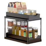 BLACK Two-tier pull-out storage rack. An organizational lifesaver for under the kitchen sink. Features adjustable shelves for easy storage of bottles and jars. In a sleek, modern design. Perfect as a kitchen shelf, bathroom organizer, or household storage